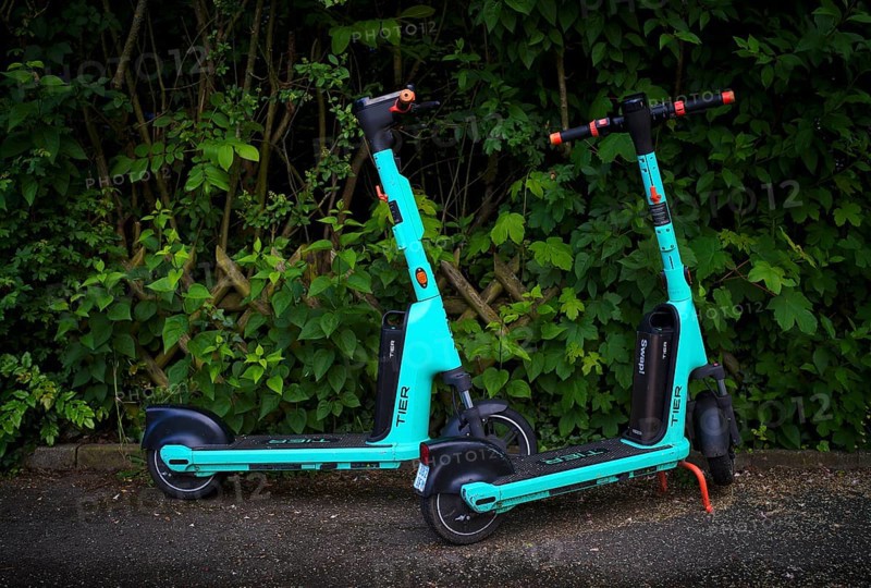 E-scooters parked at the side of the road in the TIER bike hire centre, Stuttgart, Baden-Wuerttemberg, Germany, Europe