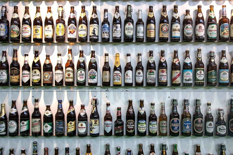 Various beer bottles from German beer producers are displayed at a stand of German brewers at the Green Week, 21 January 2014 in Berlin. (c) Jochen Eckel mail@jochen-eckel.de, www.jochen-eckel.de, B a n k v e r b i n d u n g B B A N K Konto: 533 47 48, BLZ: 660 908 00, use only for a fee + 7% VAT and mention of author. No model release! Any use is subject to a fee. Fee according to MFM. Tax number : 34/271/52130), Berlin, Germany, Europe