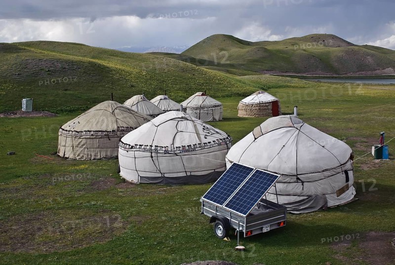 Yurt camp for tourists supplied with solar generated electricity, near lake Tolpur, Alay valley, Kyrgyzstan, Asia