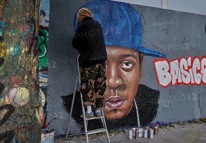 Germany, Berlin, 21.04.2024, Sunday afternoon in Mauerpark, graffiti wall, painting (spray_art) by Eme Freethinker, Basice, portrait for a friend who died of cancer, Europe