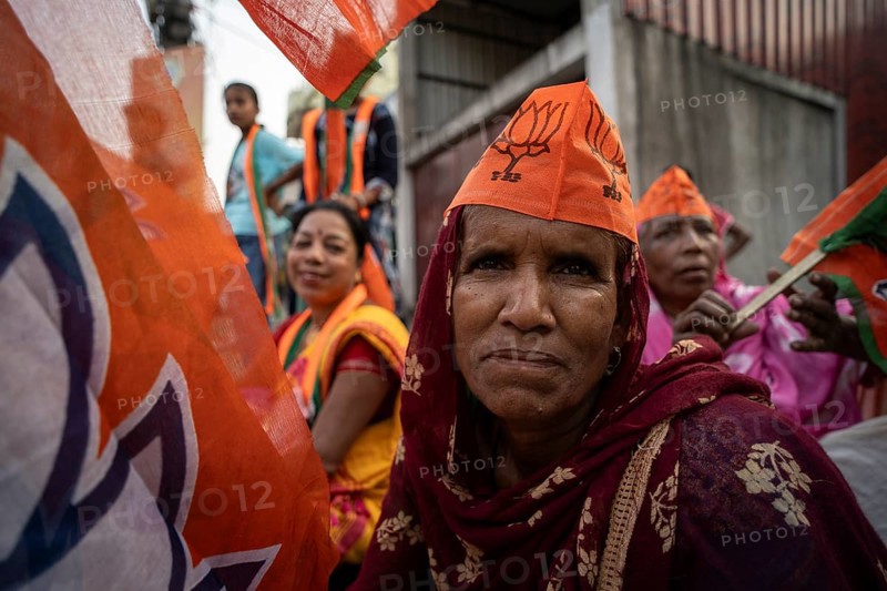 Bharatiya Janata Party (BJP) supporters arrives to to see a roadshow of Union Home minister Amit Shah, ahead of third phase of General Elections, in Guwahati, Assam, India on 29 April 2024