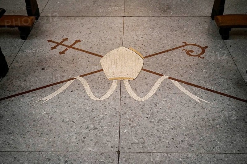 Iglesia San Nicolas de Bari, Religious symbol on the stone floor of a church, consisting of a sceptre, cap and wavy lines, Old Town, Bilbao, Basque Country, Spain, Europe