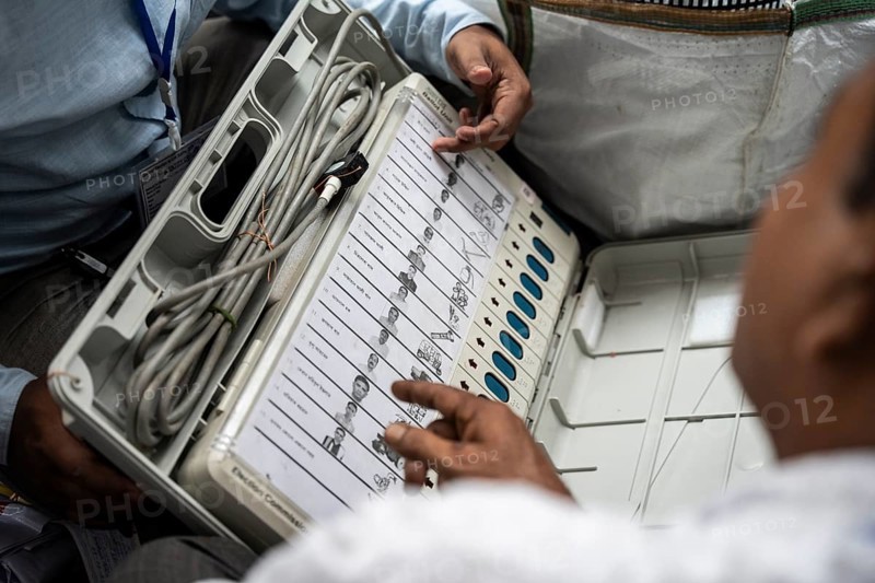 Barpeta, India. 6 May 2024. Polling officials check Electronic Voting Machines (EVMs) before leaving for allocated polling station, on the eve of the third phase of General Election on May 6, 2024 in Barpeta, India, Asia