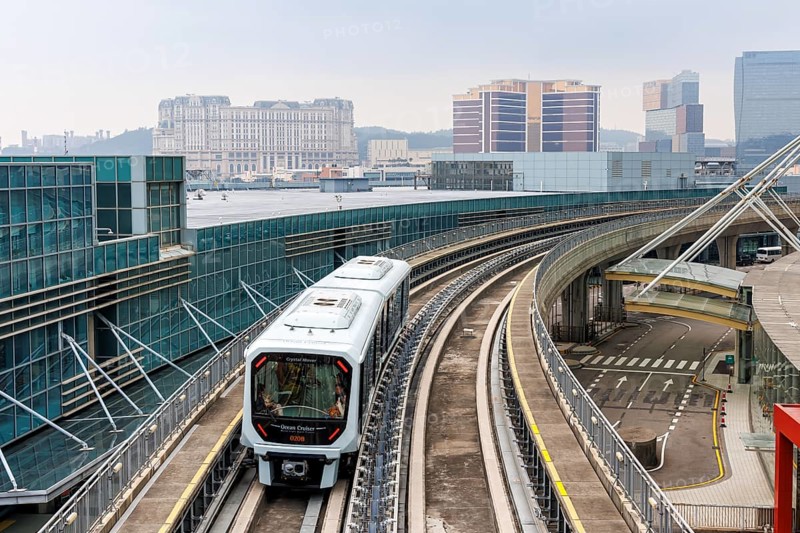 Driverless train Macao Light Rapid Transit at the airport public transport stop in Macau, China, Asia