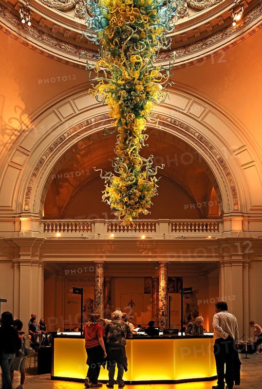 Artistic glass object in the reception hall with information stand of the Victoria & Albert Museum, 1-5 Exhibition Rd, London, England, Great Britain