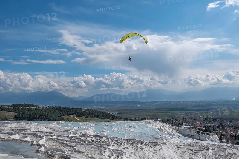 Sintered limestone terraces of Pamukkale, tandem paragliding, Pamukkale, Denizli province, Aegean region, Turkey, Asia