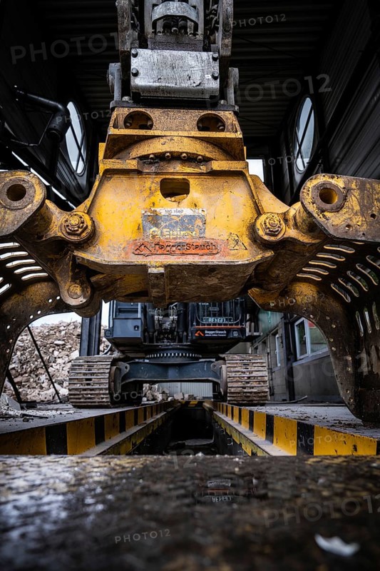 Close-up of an excavator with grab arm carrying out demolition work indoors, demolition, Saarbruecken, Germany, Europe