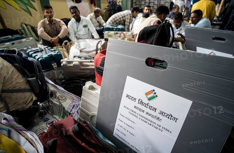 Barpeta, India. 6 May 2024. Polling officials collects Electronic Voting Machines (EVMs) and Voter Verified Paper Audit Trail (VVVPAT), before leaving for allocated polling station, on the eve of the third phase of General Election on May 6, 2024 in Barpeta, India, Asia