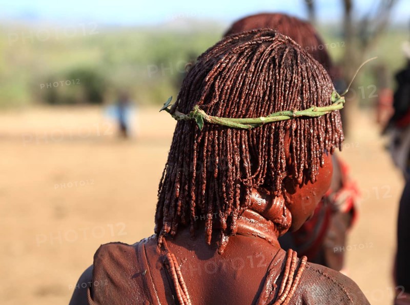 South Ethiopia, Omo region, among the Hamer people, woman with hair braided into little tufts and rubbed with butter and ochre-coloured earth, Ethiopia, Africa