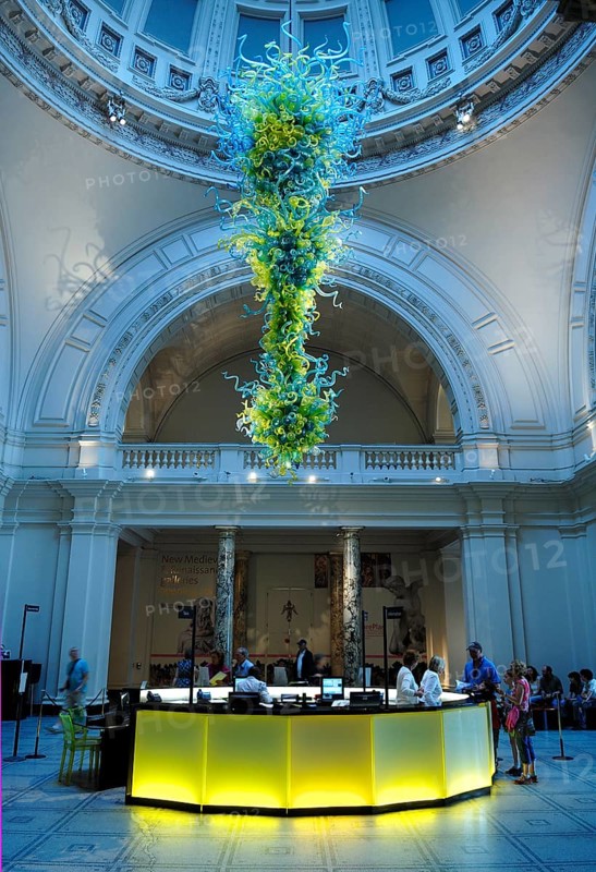 Artistic glass object under the dome in the reception hall with information stand of the Victoria & Albert Museum, 1-5 Exhibition Rd, London, England, Great Britain