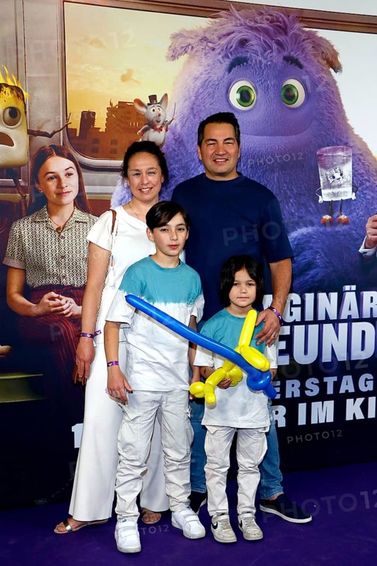 Buelent Sharif with woman Emy and sons Batuhan and Timucin-Khan at the special screening of IF: IMAGINARY FRIENDS at Berlin's CinemaxX cinema on 12 May 2024