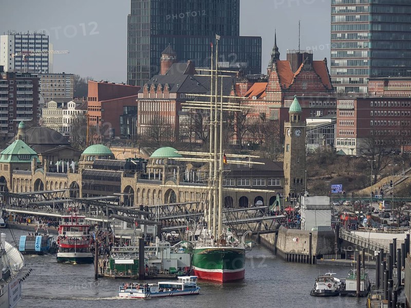 Close-up of a harbour with a sailing ship and historical next to modern buildings, many ships in a harbour with a beautiful promenade, HAmburg, Germany, Europe