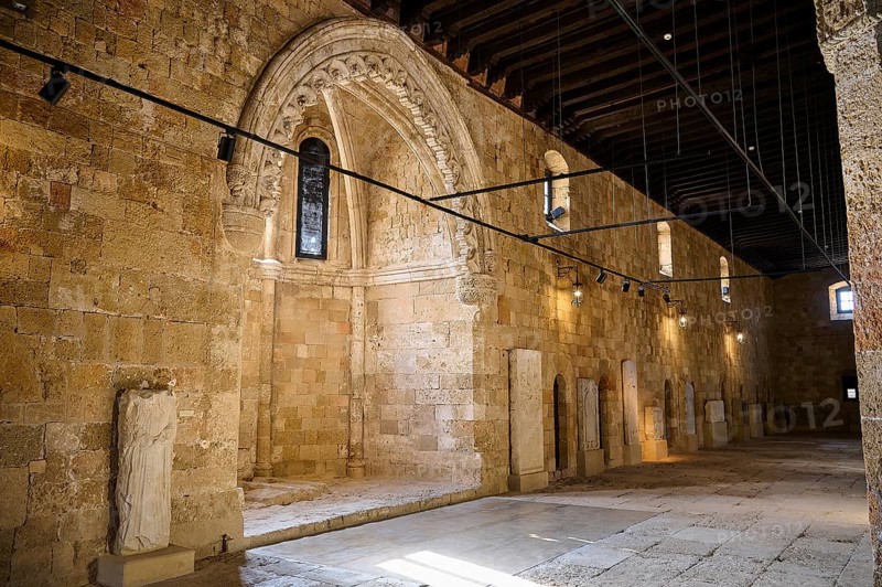 Former Great Hospital of the Order of St John, A long arcade with ornate stone walls and sculptures on display, Interior, Archaeological Museum, Old Town, Rhodes Town, Rhodes, Dodecanese, Greek Islands, Greece, Europe