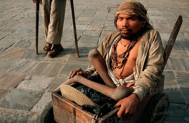 Beggars suffering from physical disabilities, handicapped persons in a street, Kathmandu, Nepal, Asia