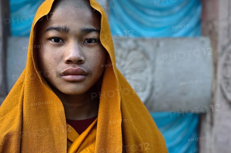 Buddhist novice at Bodhgaya, India. Bodhgaya is the place where the Buddha has attained enlightenment. This is now a major pilgrimage site for buddhists from all over the world