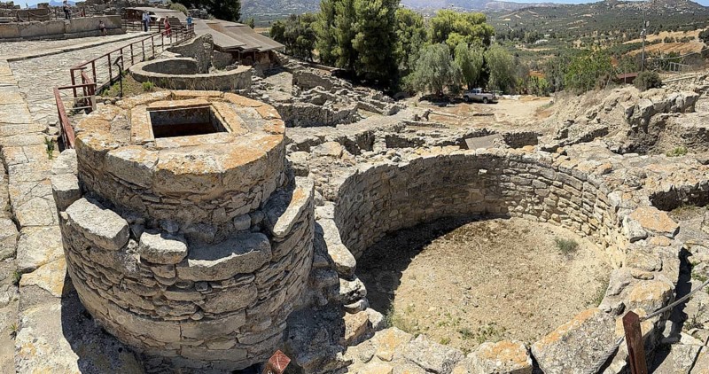 View of Kouloures so-called rings in earth embedded large brick-built round storage tanks in area of Old Palace in excavation site of Minoan culture of pre-Greek ancient Greek people Minoans, hill of Phaistos, Kamilari, Crete, Greece, Europe