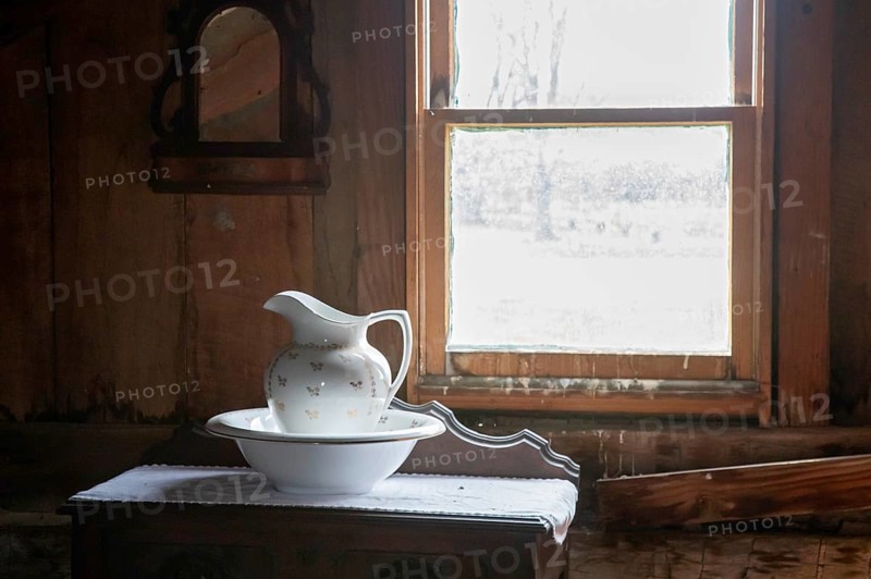 Fort Dodge, Iowa, A pitcher and washbasin in a bedroom at the Carlson-Richey Cabin at the Fort Museum and Frontier Village. Operated by the Fort Dodge Historical Foundation, the museum displays the frontier life of the 1850s