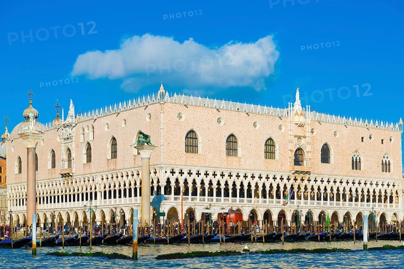 Ducal Palace on Saint Mark Square and Grand Canal with Many Gondola in a Sunny Day in Venice, Veneto, Italy, Europe