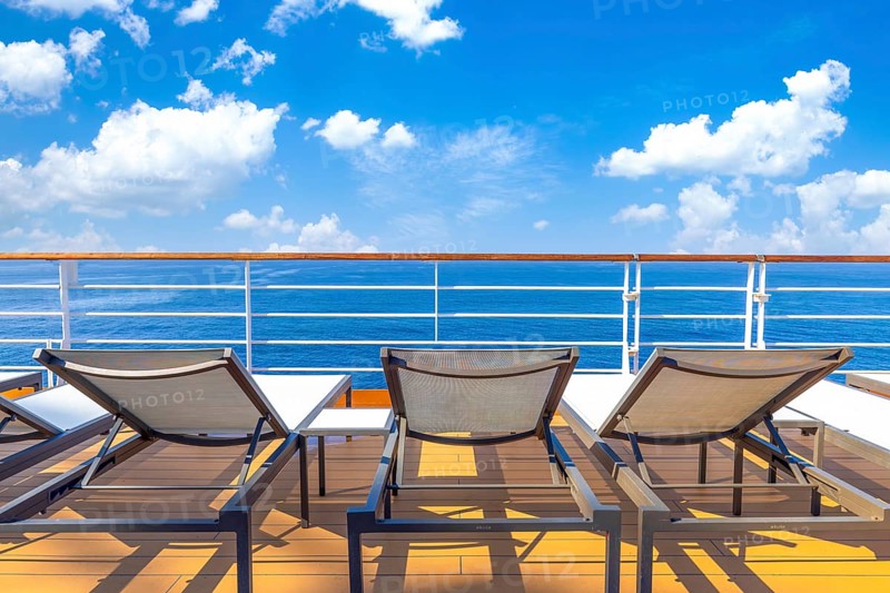 Luxury cruise ship sailing in the sea on Caribbean vacation. Scenic ocean views from deck