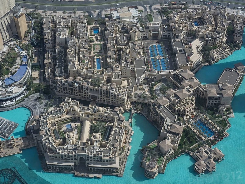 Luxury hotel complexes with several swimming pools and turquoise-coloured water, presented in modern architecture, Dubai, Arab Emirates