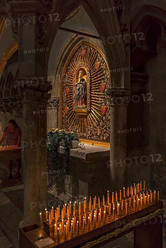 Madonna in a halo in the Sailer Chapel, sacrificial candles in front, St Peter's Cathedral, Regensburg, Upper Palatinate, Bavaria, Germany, Europe
