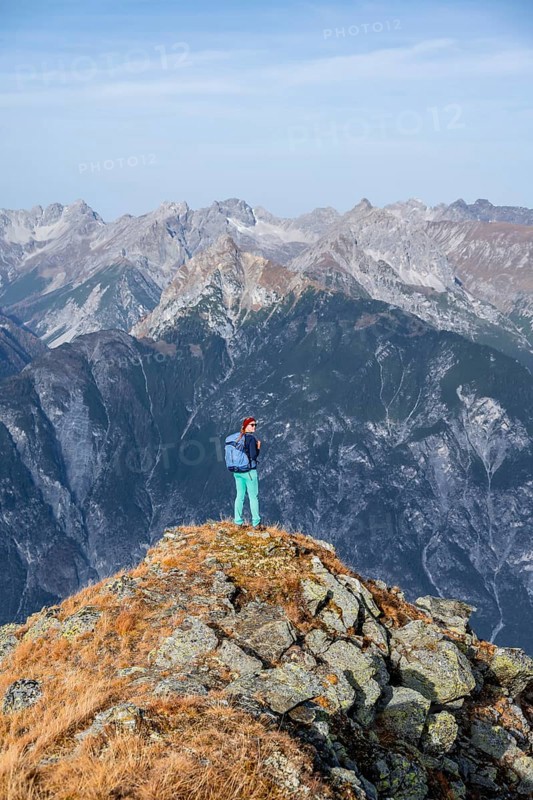 Mountaineer in the mountains in autumn, Venet crossing, Oetztal Alps, Tyrol, Austria, Europe