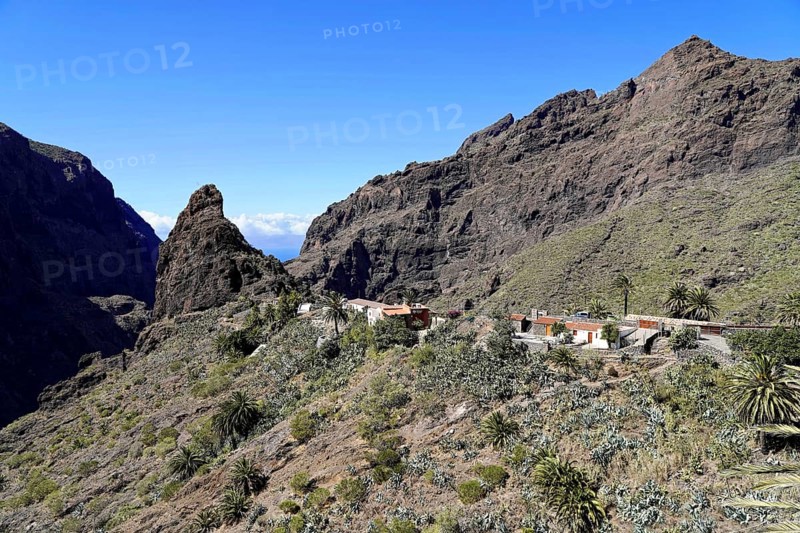 Mountain village Masca, Masca Gorge, Montana Teno Mountains, Tenerife, Canary Islands, Spain, Europe, A small village on the slopes of the mountains with impressive rocks and sky, Europe