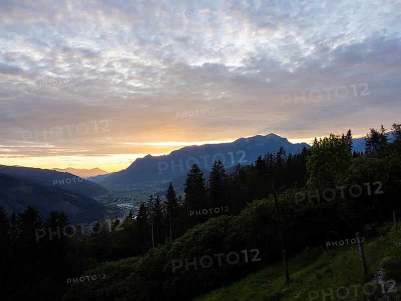 Sunset over the Eisenerz Alps, mountain massif Reiting, in the Liesingtal the village Traboch, view from the lowlands, Leoben, Styria, Austria, Europe