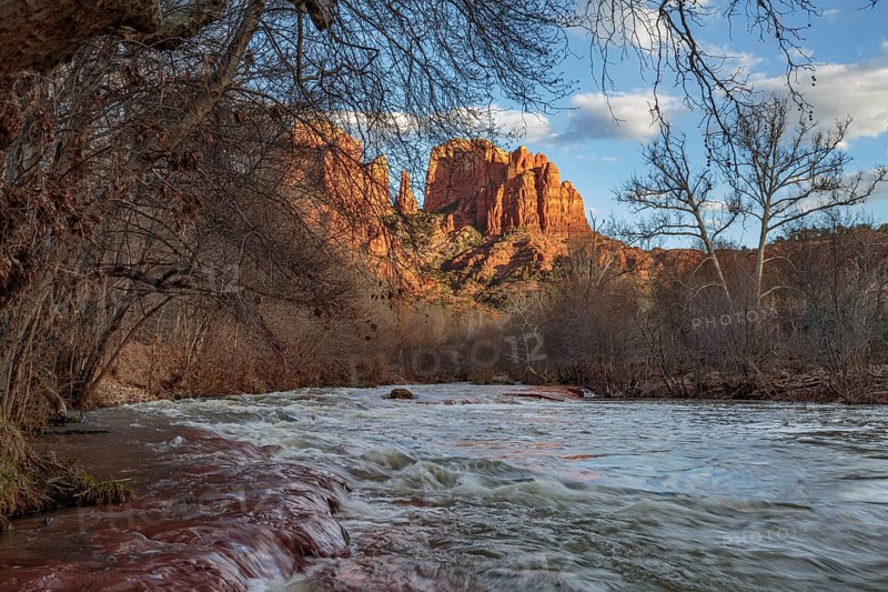 Cathedral Rock sandstone formations tower over Oak Creek at the Crescent Moon Picnic Site in Sedona, Arizona, United States of America, USA, North America