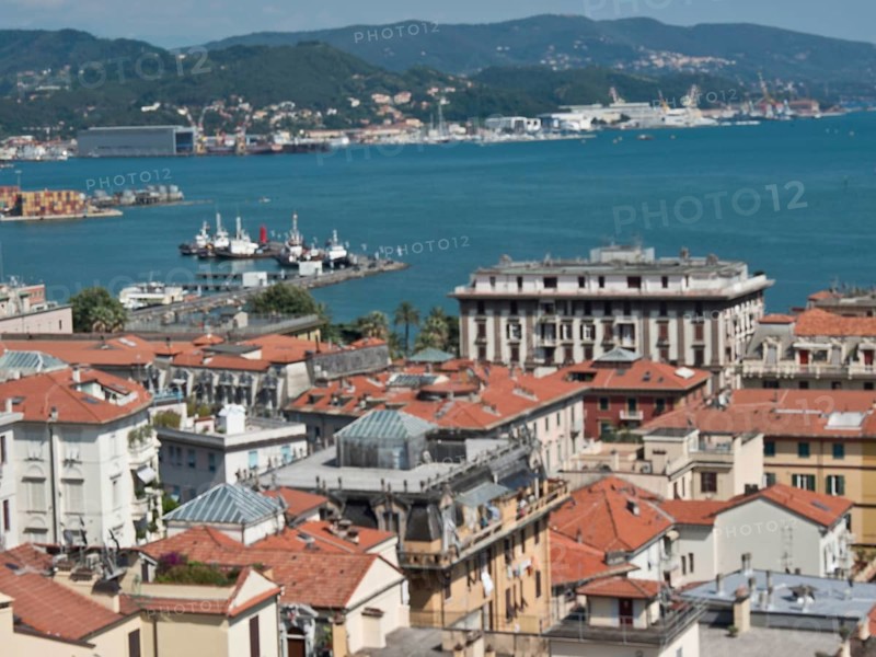 City view with red roofs, harbour, sea and surrounding hills on a clear day, Bari, Italy, Europe