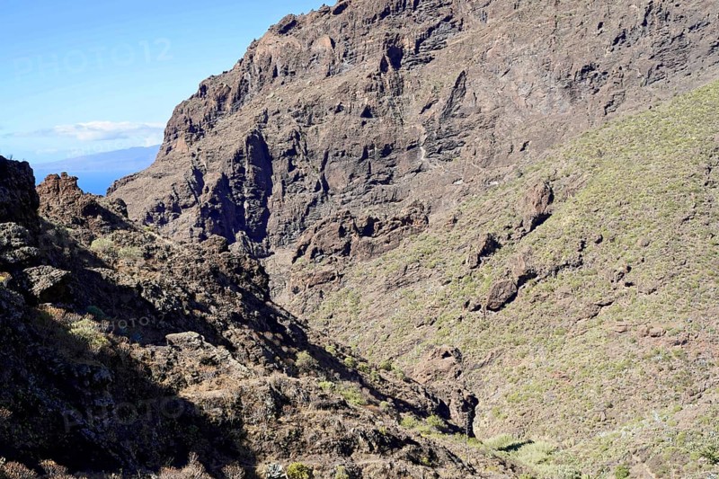 Mountain village Masca, Masca Gorge, Montana Teno Mountains, Tenerife, Canary Islands, Spain, Europe, Rocks and steep mountains in a gorge-like landscape with dry vegetation and blue sky, Europe