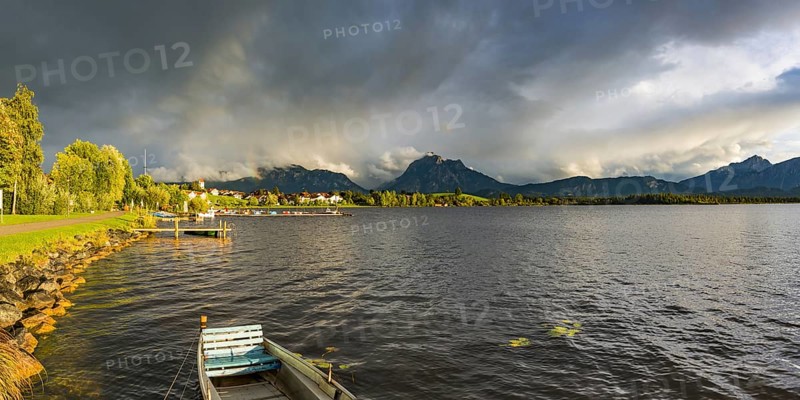 Rainbow, Hopfensee, behind it Hopfen am See and Ammergau Alps, near Fuessen, Ostallgaeu, Allgaeu, Bavaria, Germany, Europe