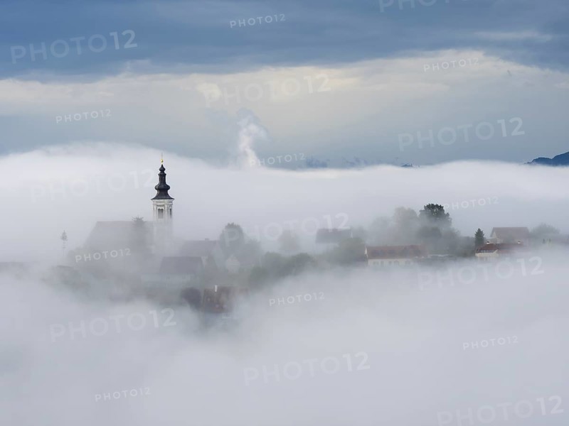 Church rises out of the morning mist, Frauenberg pilgrimage church, near Leibnitz, Styria, Austria, Europe