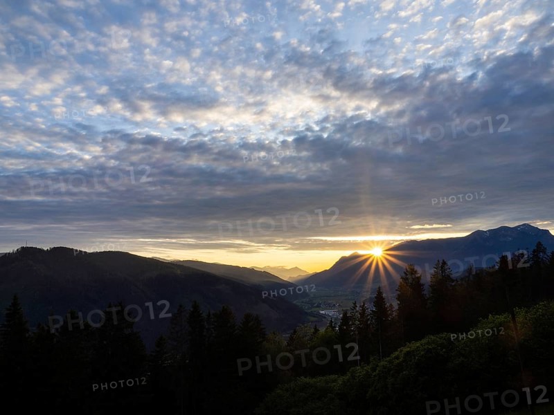 Cloudy mood, sunset over the Eisenerz Alps, mountain massif Reiting, in the Liesingtal the village Traboch, view from the lowlands, Leoben, Styria, Austria, Europe