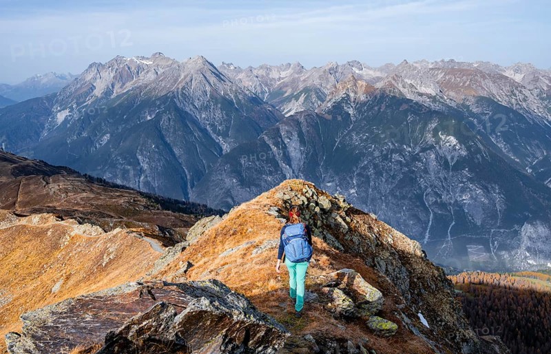 Mountaineer in the mountains in autumn, Venet crossing, Oetztal Alps, Tyrol, Austria, Europe