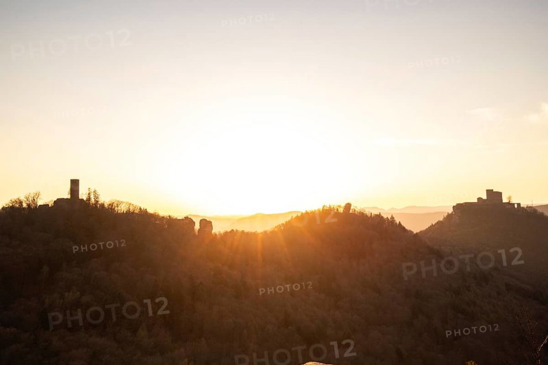 View of Trifels Castle, from Engels Landing rock, with the young tower in autumn at sunset. Beautiful landscape in the Palatinate Forest, Rhineland-Palatinate, Germany, Europe