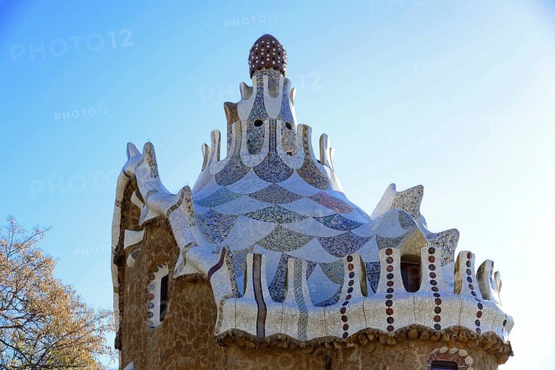 Antoni Gaudi, Park Guell, UNESCO World Heritage Site, Barcelona, Catalonia, Spain, Europe, An architectural detail of a roof with wavy structures and colourful mosaics on a building, Europe