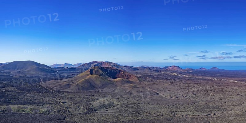 Panorama from the crater rim of Caldera Blanca to the fire mountains in the Parque National de Timanfaya, Lanzarote, Canary Islands, Spain, Europe