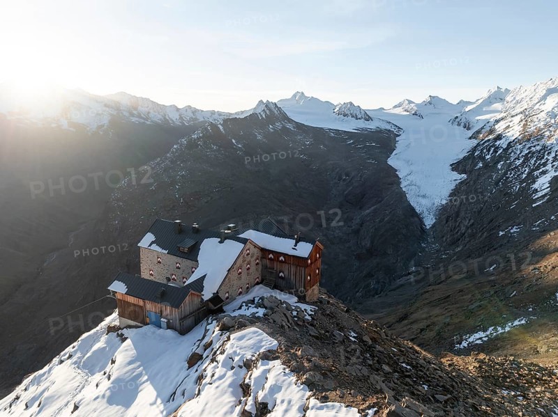 Mountain panorama and glacier, mountain hut Ramolhaus in autumn with snow, view of Gurgler Ferner with summit Hochwilde and Falschungsspitze, Oetztal Alps, Tyrol, Austria, Europe