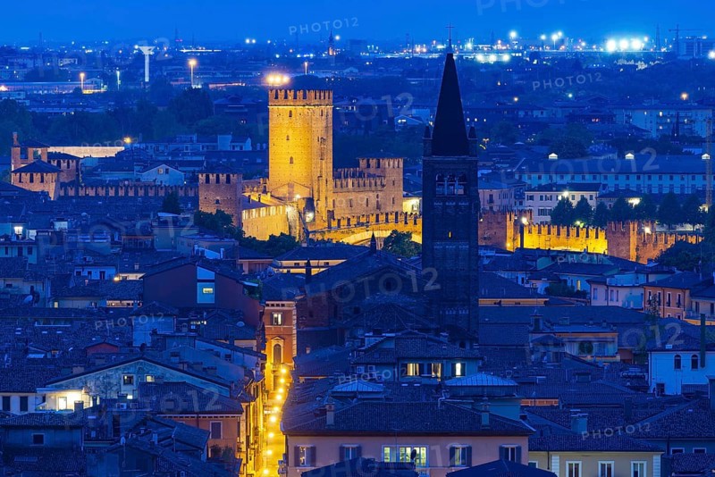 View of the illuminated Castelvecchio castle and the church of San Lorenzo, Verona, Veneto, Italy, Europe