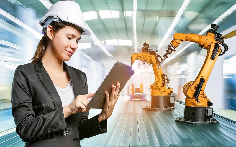 Industrial engineer with tablet control, automation of robotic arms, intelligent monitoring, AI generated, AI generated