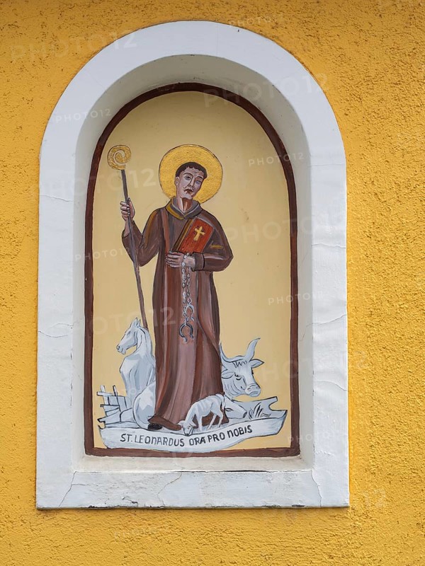 Image of a figure of a saint, fresco on a wayside cross, near St.Andrae-Hoech, Sausaler Weinland, Styria, Austria, Europe