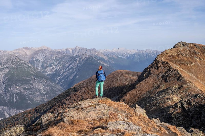 Mountaineer in the mountains in autumn, Venet crossing, Oetztal Alps, Tyrol, Austria, Europe