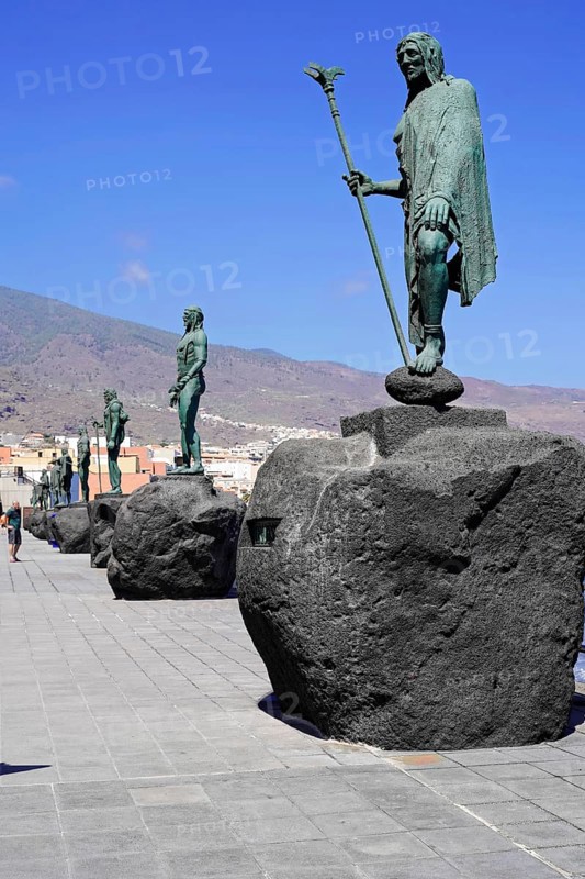 Statues of the Guanche Kings or Mencey Statues, front Guanche King Adjona, Candelaria seafront promenade, Tenerife, Canary Islands, Spain, Europe, row of majestic statues along the coast under a clear blue sky, Europe