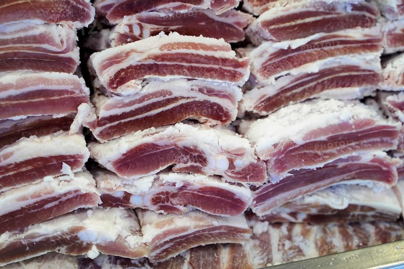 Market hall, Mercado de Nuestra Senora de Africa, Santa Cruz de Tenerife, Tenerife, Canary Islands, Spain, Europe, Close-up of stacked bacon strips, showing the details and structure of the meat, Europe