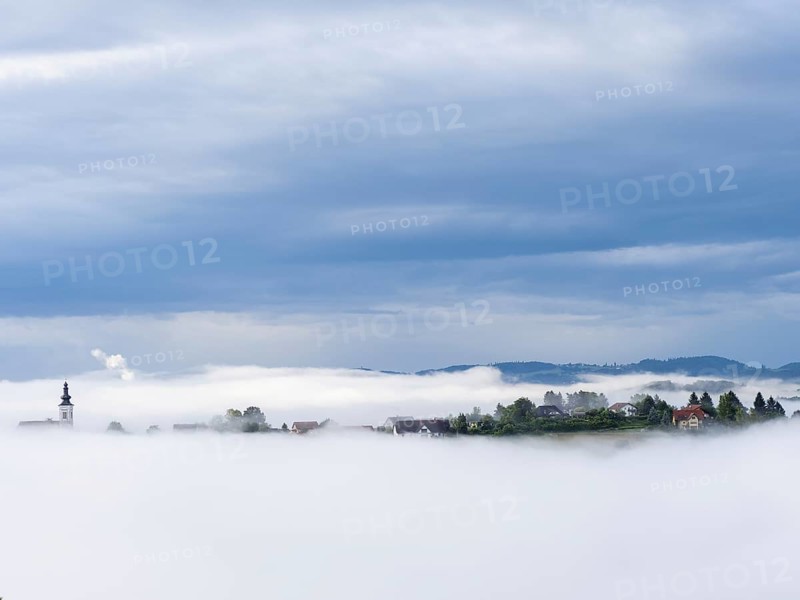Church rises out of the morning mist, Frauenberg pilgrimage church, panoramic view, near Leibnitz, Styria, Austria, Europe