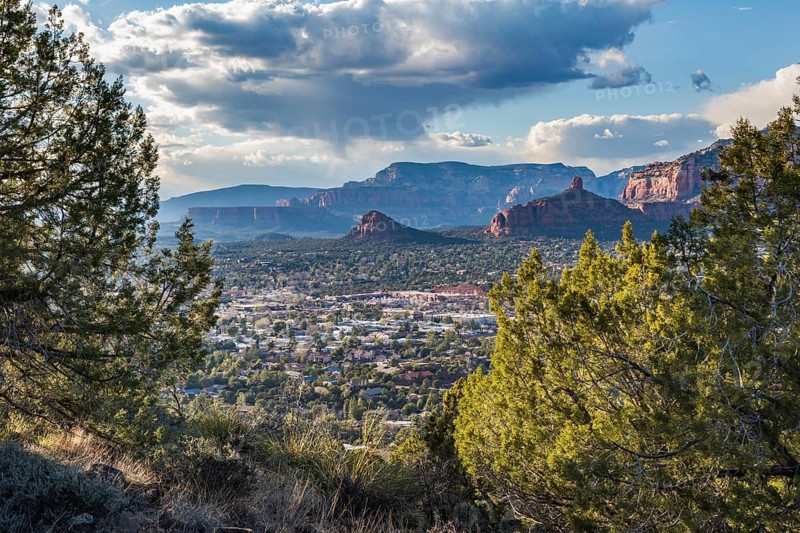 The town of Sedona, Arizona in a valley surrounded by red rock limestone rock formations, United States of America, USA, North America