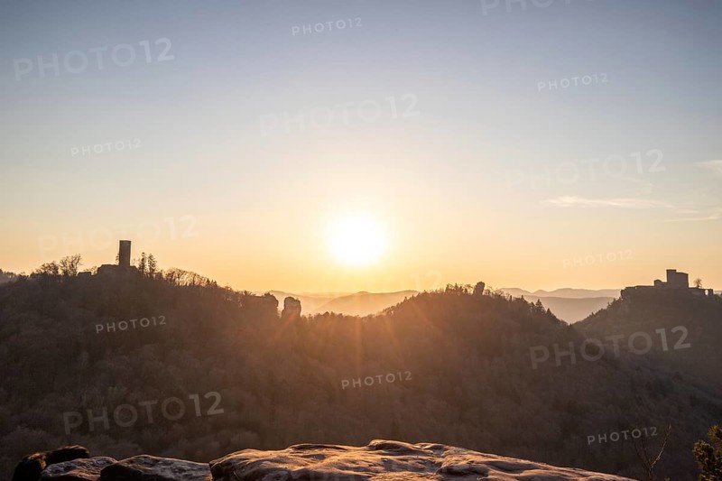 View of Trifels Castle, from Engels Landing rock, with the young tower in autumn at sunset. Beautiful landscape in the Palatinate Forest, Rhineland-Palatinate, Germany, Europe