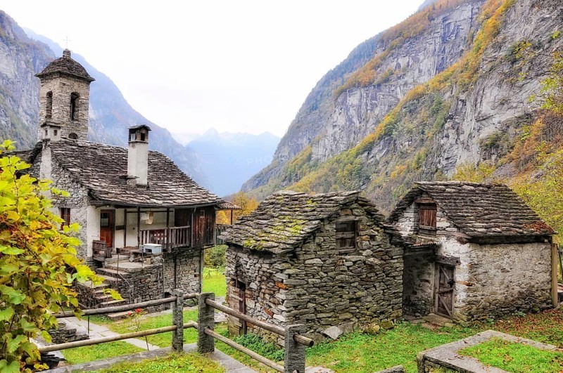 Beautiful Rustic House and Church in Mountain Valley in Autumn in Val Bavona, Ticino, Switzerland, Europe