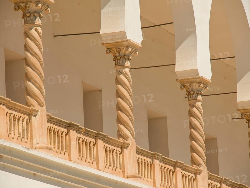 Close-up of architectural columns with ornate details in a light-coloured building, Tunis in Africa with ruins from Roman times, modern mosques and blue and white houses in sidi-bou-said, Tunis, Tunisia, Africa